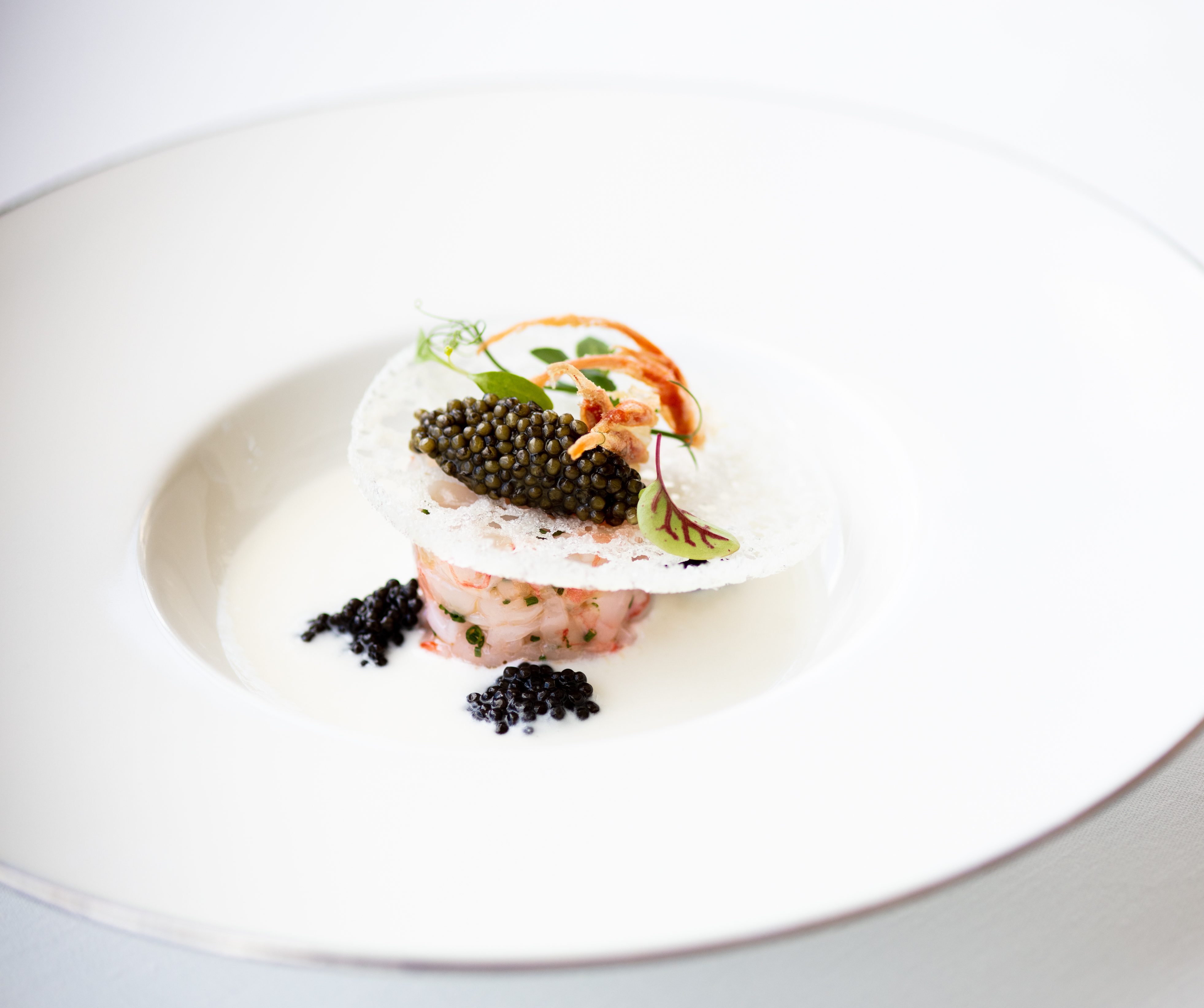 Ettore Bocchia’s Antonius Caviar and Sanremo Prawns served with Cauliflower Sour Cream and a Crispy 